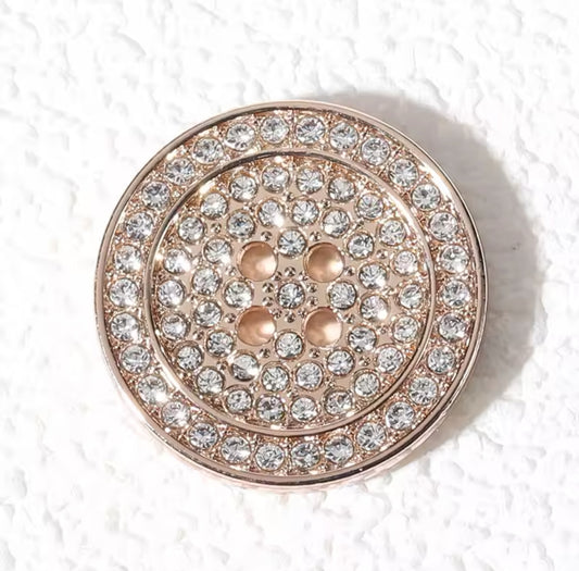 Gold crystal button